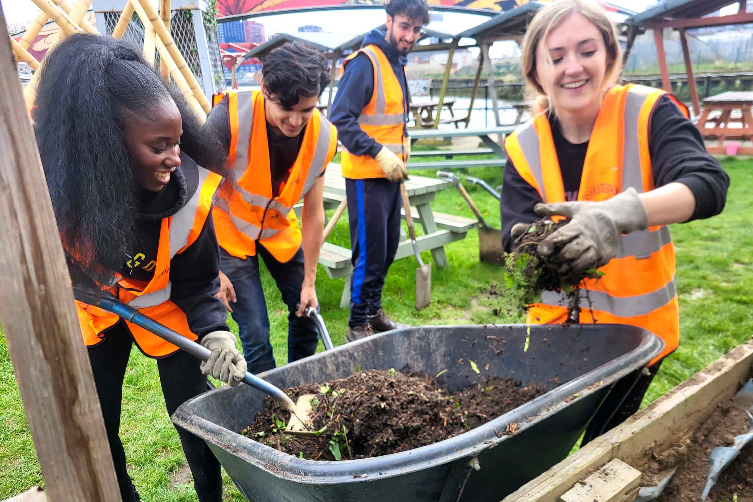 Environmental volunteers working in a green landscape